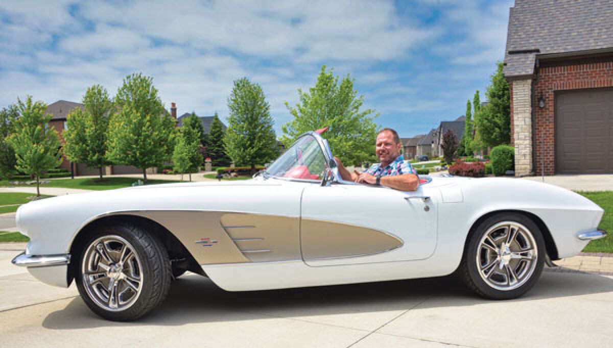  Jeff Grillo, of Rochester Hills, purchased this 1961 Chevrolet Corvette in 2018. He keeps cigars on hand in honor of the car’s previous owner, Bob Johnson Sr., who passed away before the Corvette was restored. 