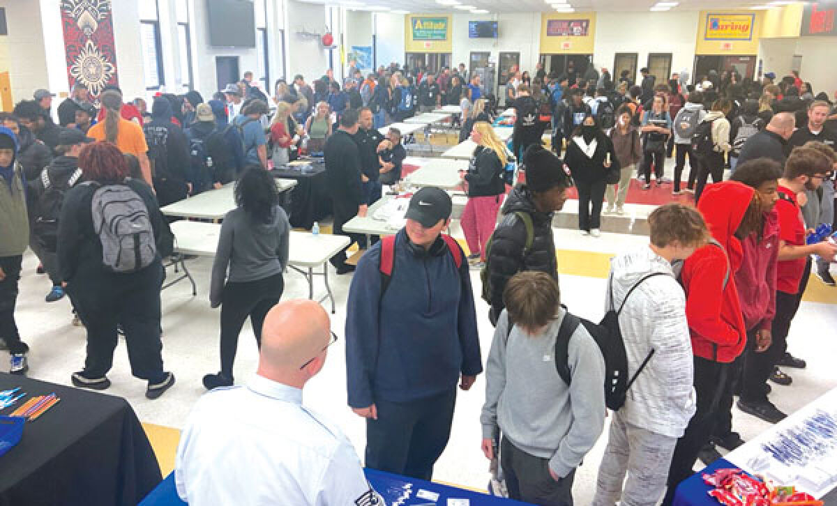  Roseville High School students speak with career technical education professionals during the school’s “Career Showcase” Oct. 24. 