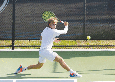  Bloomfield Hills Cranbrook Kingswood senior Owen DeMuth performs a backhand shot at the Michigan High School Athletic Association Division Three State Championship Oct. 15. 