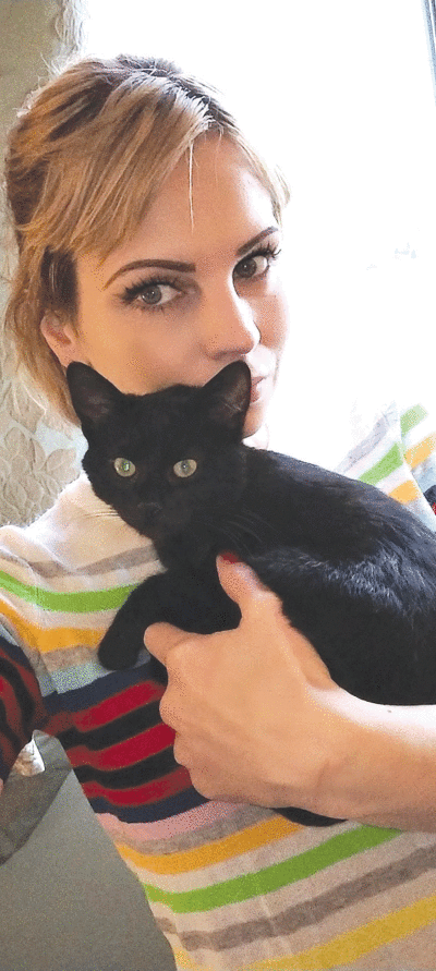  : A tiny black kitten named Mouse has found a forever home with foster parent volunteer and Huntington Woods resident Tresse Roby. 