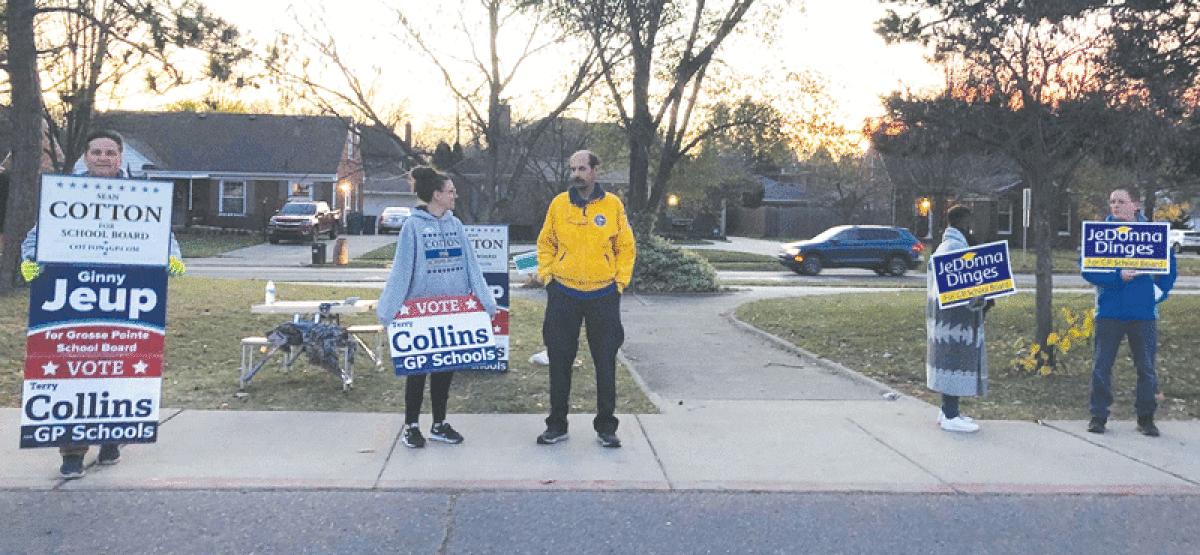  Grosse Pointe school board candidates and their supporters campaign outside Maire Elementary School in Grosse Pointe City Nov. 8. 
