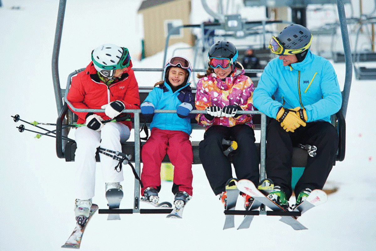  Skiers ride the lift at Mount Brighton. 