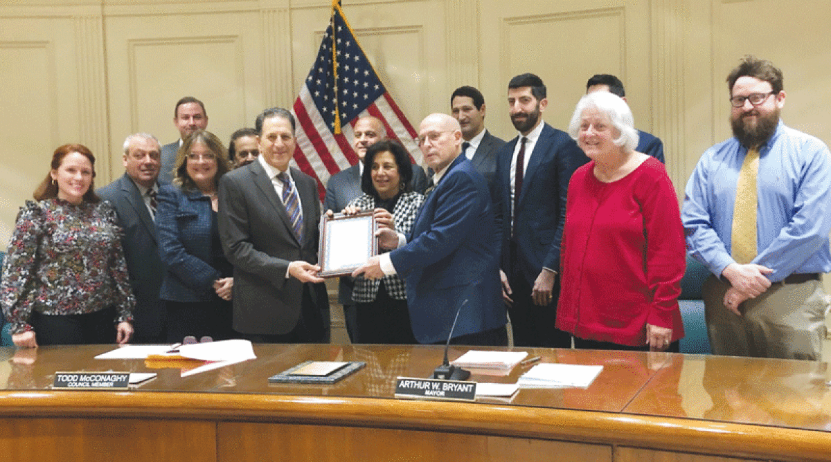  The Grosse Pointe Woods City Council honors members of the Ahee family for the 75th anniversary of their jewelry store during a Nov. 21 council meeting. 