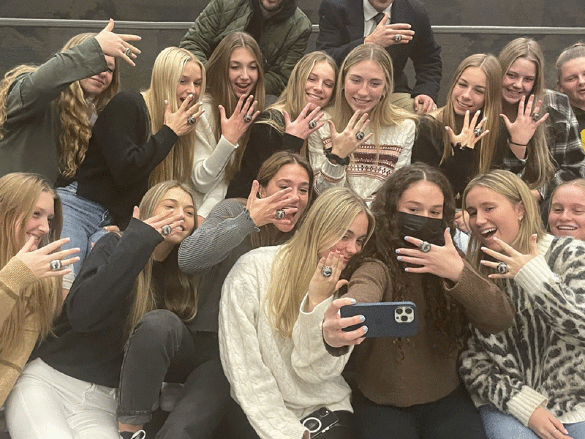  The 2022 Division One State Champions take a team selfie in celebration of their success at a ring ceremony Dec. 19 at Bloomfield Hills High School. 