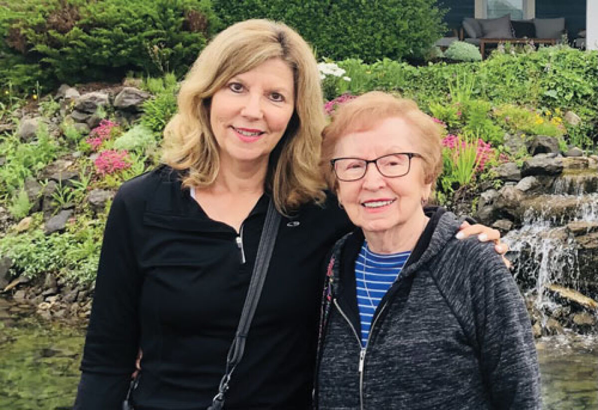  West Bloomfield resident Lori Klisman Ellis, left, is pictured with her mom, Sophie Tajch Klisman. It was only approximately seven years ago that Ellis learned her mom’s story of being a Holocaust survivor. Ellis has authored a book about her mom’s experiences. 