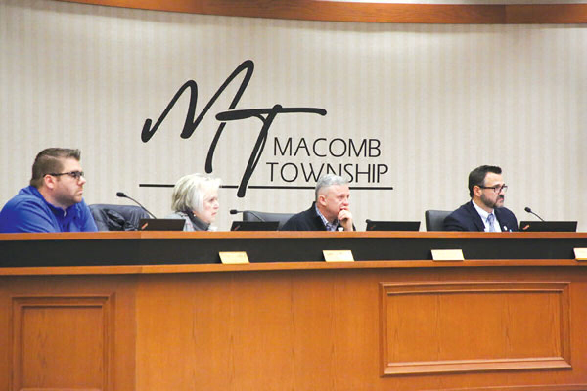  Members of the Macomb Township Board of Trustees — (left to right) Trustee Peter Lucido, Trustee Nancy Nevers, Treasurer Leon Drolet and Township Supervisor Frank Viviano — listen as Department of Public Works Director Kevin Johnson discusses purchasing new trucks on Jan. 11. 