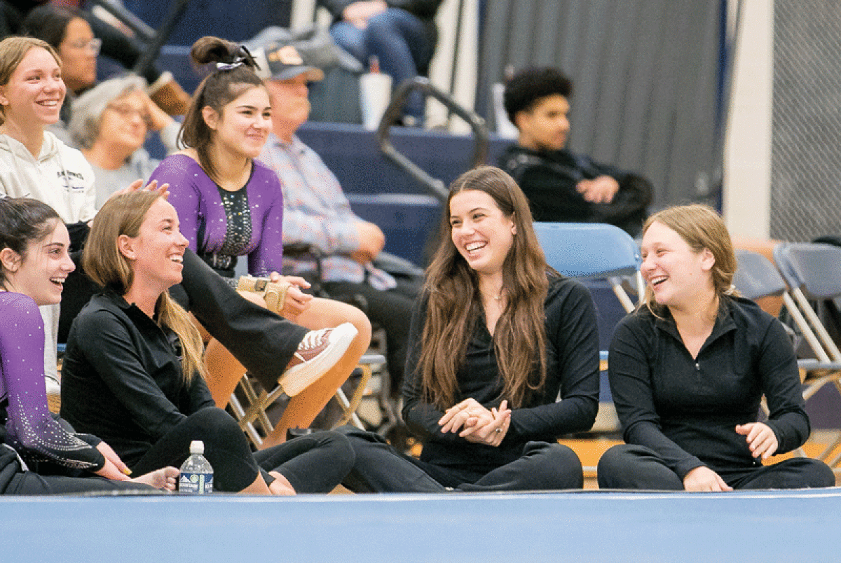  Bloomfield Hills gymnastics is all smiles at the Fraser Invitational Jan. 7 at Fraser High School. 