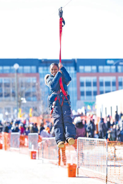  Activities include ice skating, live music and, as seen here from last year’s event, zip lining. 