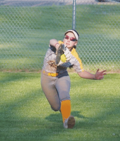  Rochester Adams junior Ella McDonald showcases her defensive skills tracking down a fly ball against Oxford High School May 24. 