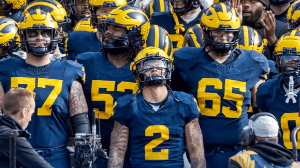 Michigan star Blake Corum to meet fans for charity toy drive at