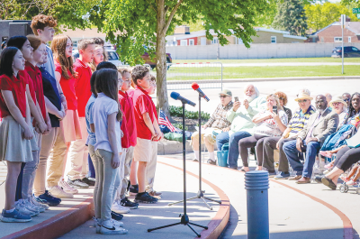  The Warren Woods Christian School’s choir sings “America the Beautiful” to the delight of the audience at the National Day of Prayer at Warren City Hall on May 2.  