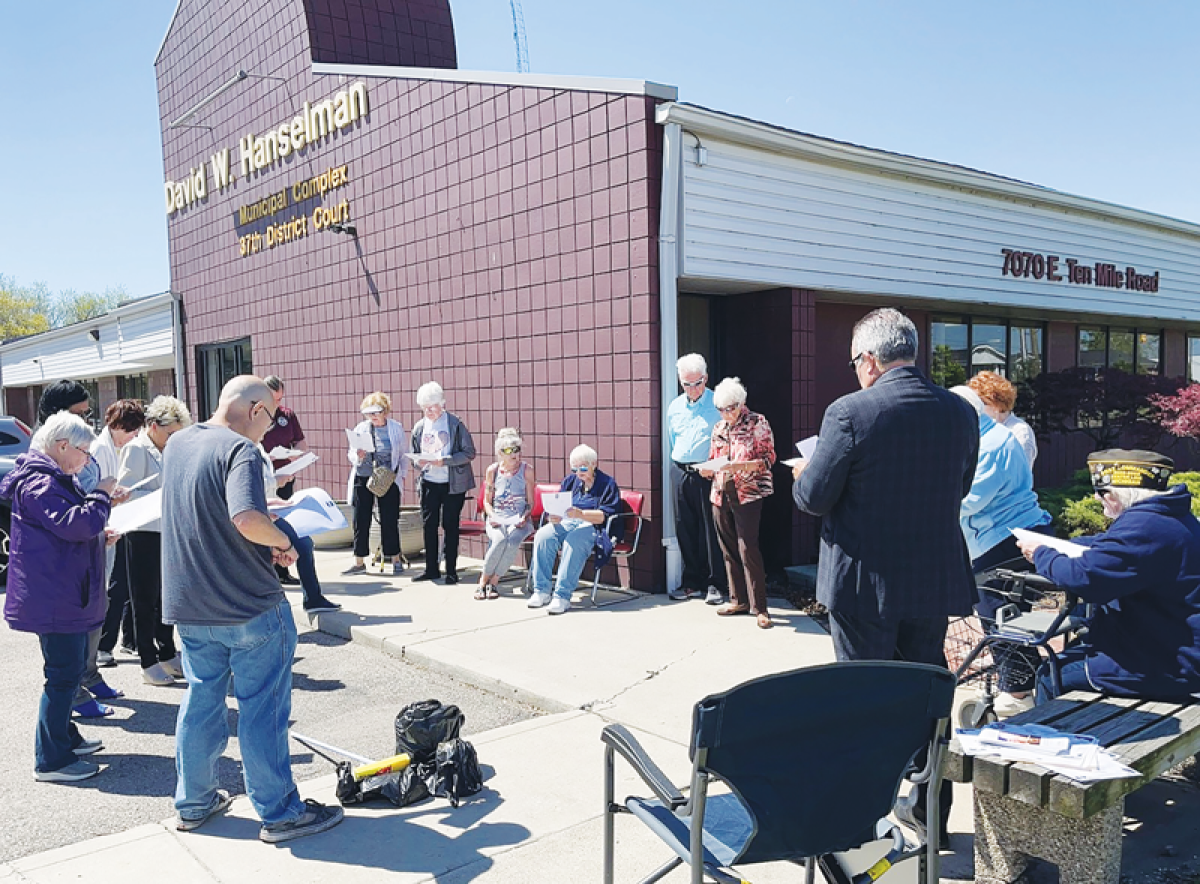  Local residents and employees gather outside the David W. Hanselman Municipal Complex  on May 2 for the city’s National Day of Prayer ceremony. 