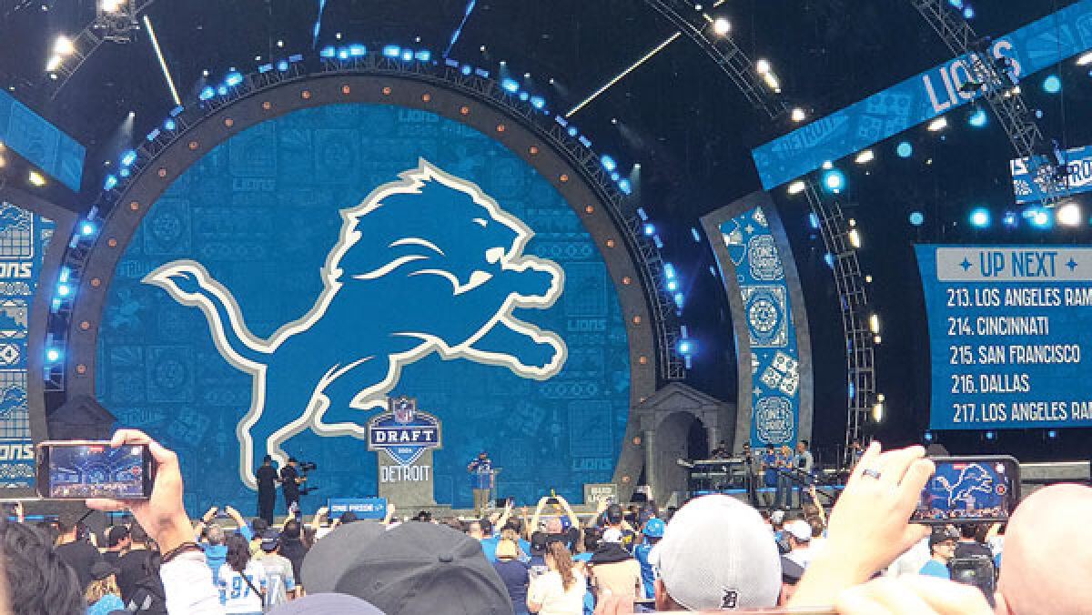  Detroit Lions fans await the team’s second pick in the sixth round of the NFL Draft in Detroit April 27. The Lions chose Boston College guard Christian Mahogany with the pick. 