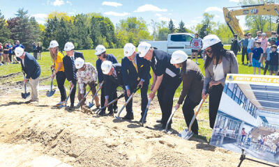  Members of the Board of Education participate in the groundbreaking ceremony for the new Smith Middle School. 