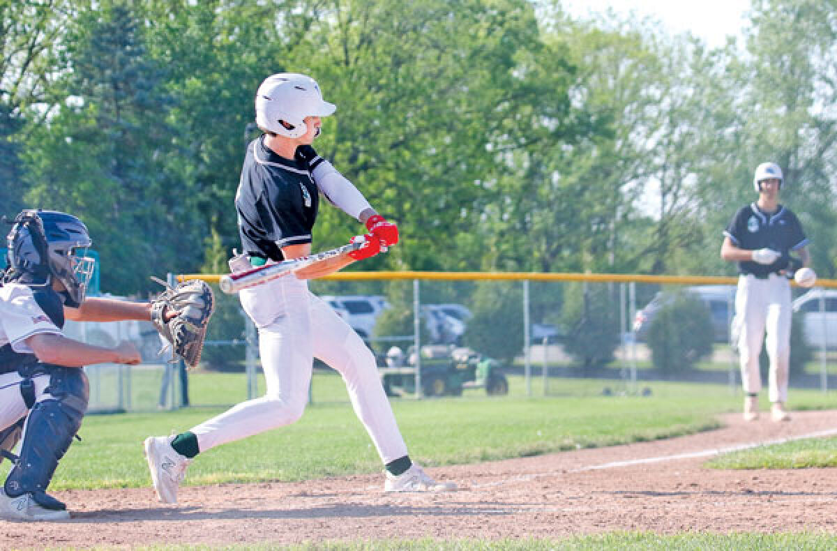  West Bloomfield junior Slade Moore takes a swing during a matchup against Rochester High School May 15 at Rochester High School. 