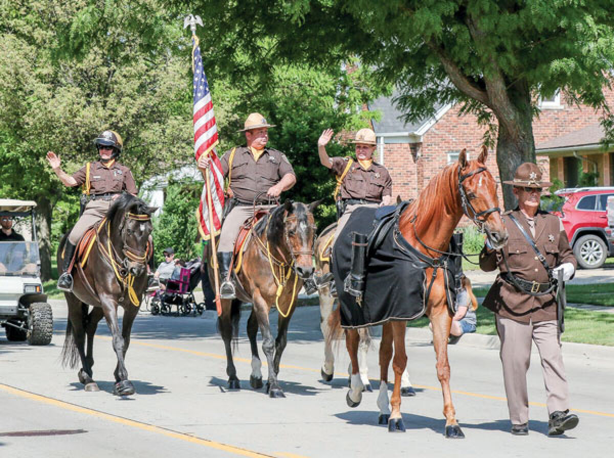  The Macomb County Sheriff Mounted Division is always a crowd pleaser in the Roseville Memorial Day parade. 