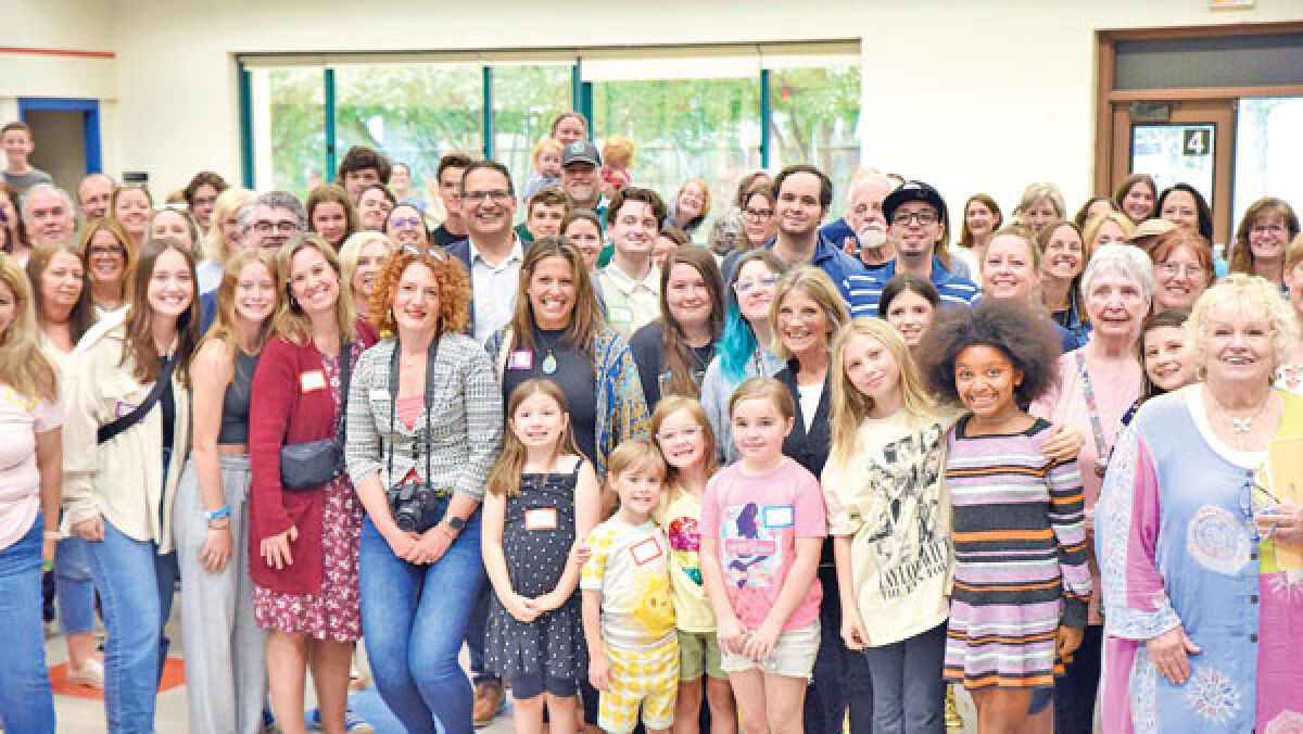  Lois Mann’s 50-year anniversary brought together nearly 100 of her past and present students and co-workers.  