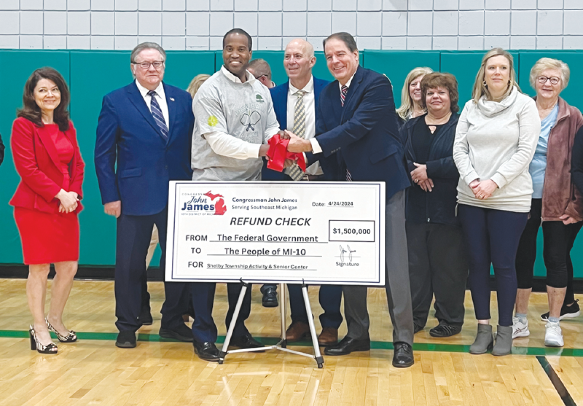  U.S. Rep. John James delivers a $1.5 million federal grant to Shelby Township officials April 24 to support an addition to the Shelby Township Activities Center. 