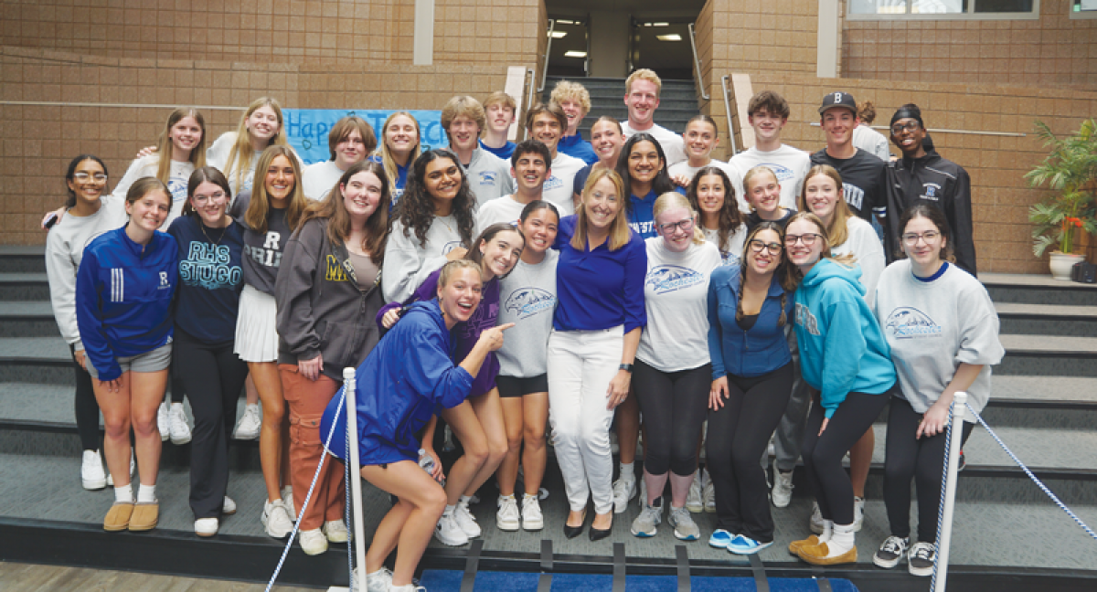  Rochester High School teacher Kelley Cusmano celebrates with members of the school’s student council after being named the 2024-25 Michigan Teacher of the Year. 