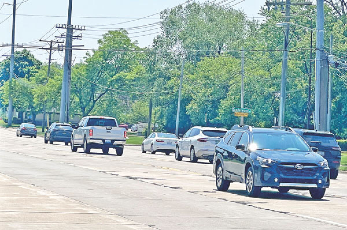  Commuters in Troy drive on Rochester Road, which will soon be under construction this summer from Sylvan Glen to South Boulevard. 