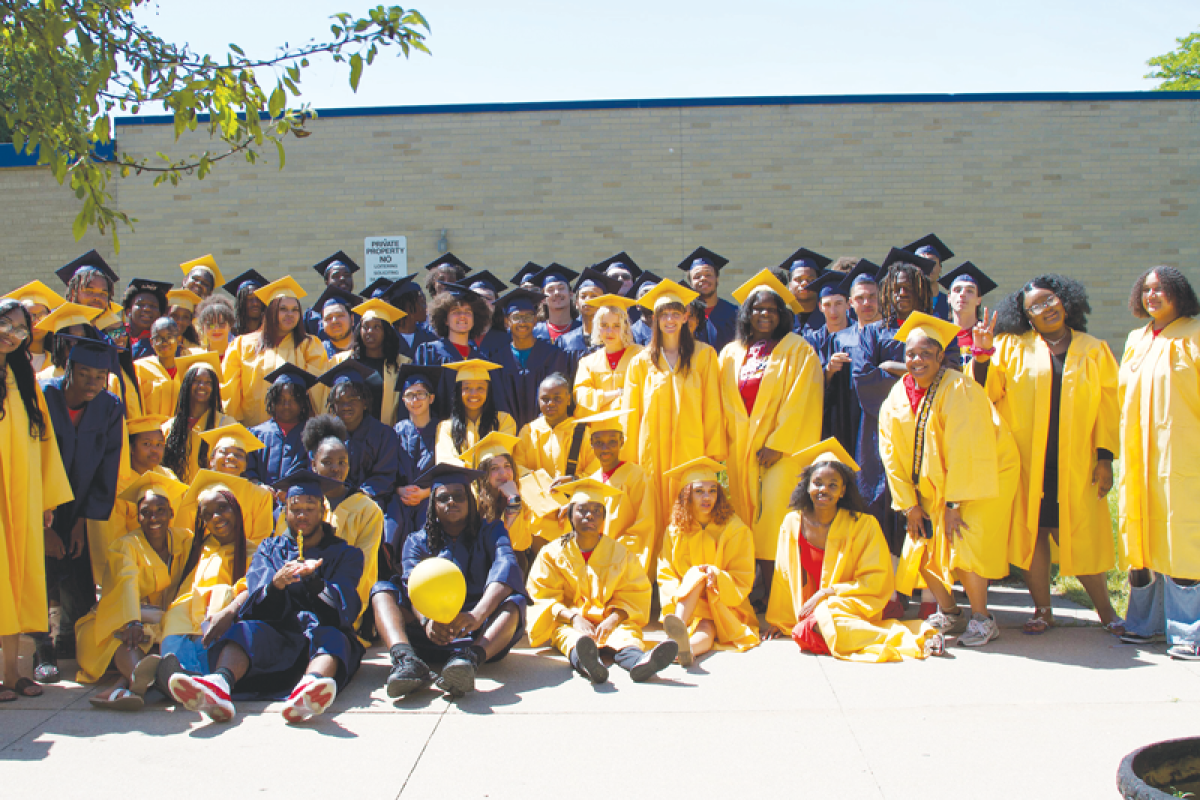  The Clintondale class of 2024 poses for a picture prior to walking  the halls of the middle school one last time. The seniors traveled to the district’s middle school, elementary schools and back to the high school to say  goodbye for the annual tradition.  