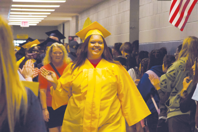  Brieanna Hurst leads the way down the halls of Clintondale Middle School for the senior clap out on May 24. The class of 2024 traveled to the district’s middle school, elementary schools and back to the high school to say goodbye for the annual tradition. 