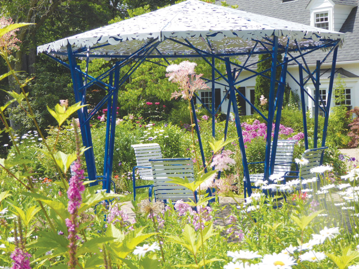  Julie Dawson’s garden features a gazebo that  is laser-cut with one of her kaleidoscope designs.  