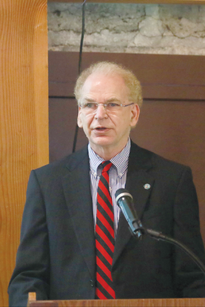  Rochester Mayor Stuart Bikson delivers his 2024 State of the City address May 20 in the  calf barn at the Rochester Hills Museum at Van Hoosen Farm.  