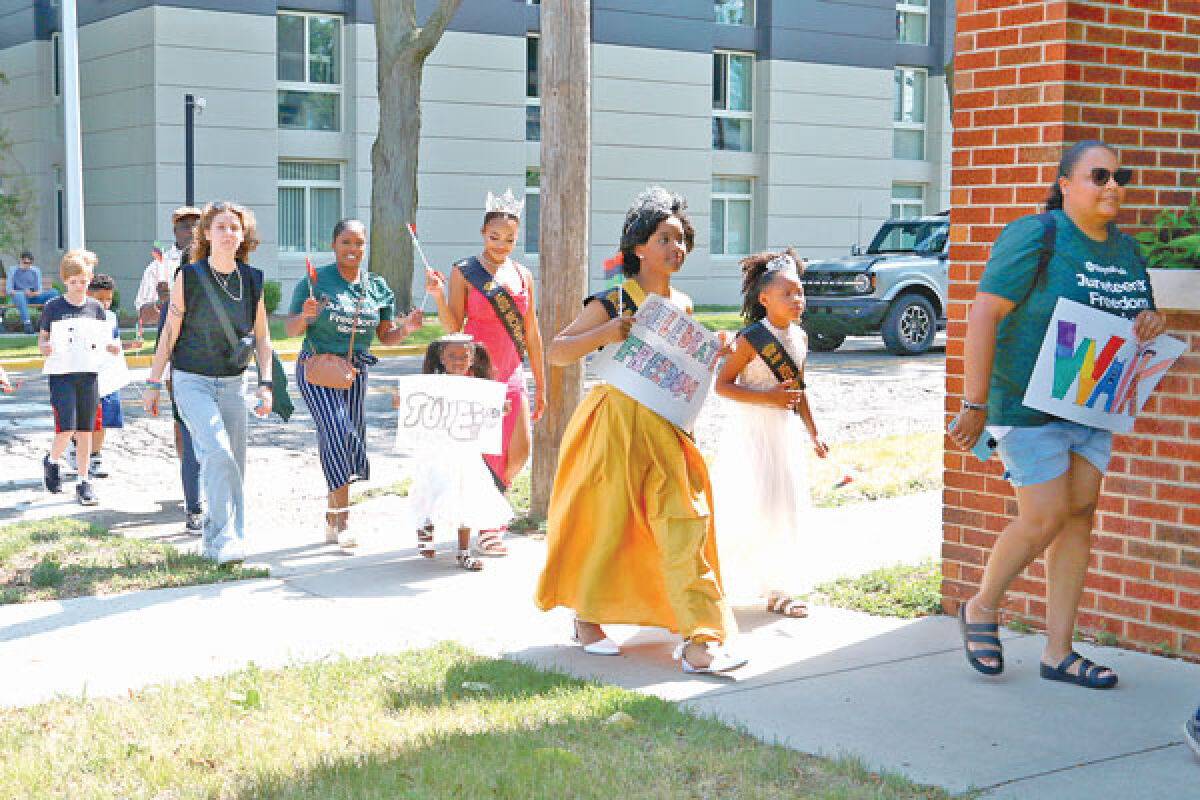  Attendees at Royal Oak’s 2023 Juneteenth event participate in the Juneteenth Freedom Strive, a 1,865-step march that signifies the year that word of the Emancipation Proclamation reached Galveston, Texas. 