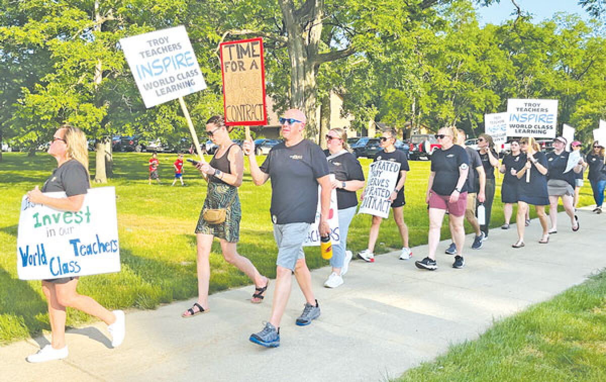  Before the Troy Board of Education’s meeting May 21, Troy School District teachers and supporters picketed at the Troy School District Services Building. 