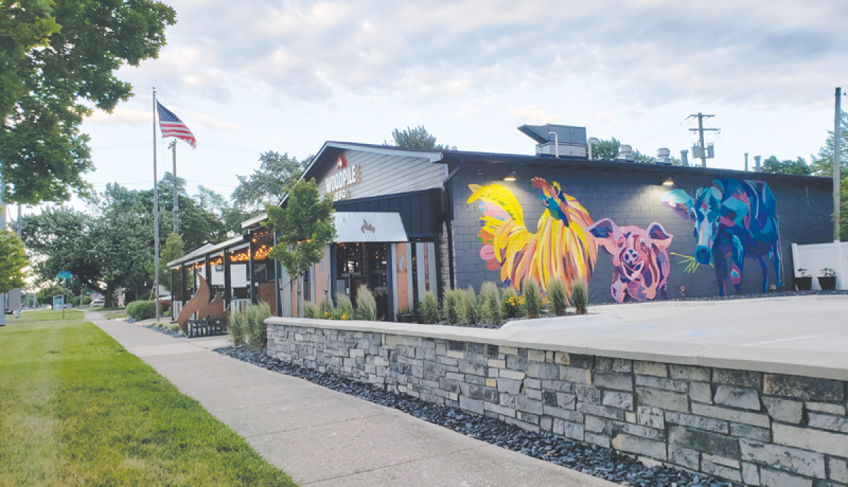  Woodpile BBQ, 630 E. 11 Mile Road, was cited as an example of the sort of downtown-style business that the city wants in its new City Center Form-Based District, included in the zoning update. A sidewalk out front, and parking to the back and side, promotes walkability while the splashy mural creates a stronger sense of place. 