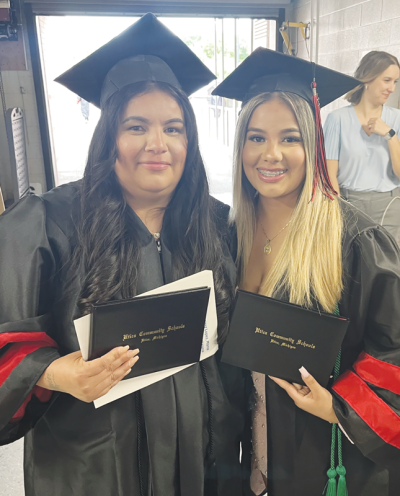  Maria Ramirez López and her daughter, Ashley Rivera, graduated June 8 at the same Utica Community Schools commencement ceremony at the O’rena on the campus of Oakland University. 