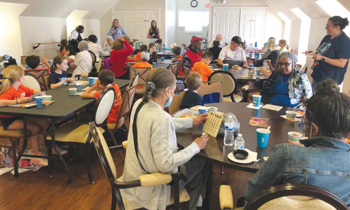  Students from Maire Elementary School team up with local seniors June 6 at The Helm at the Boll Life Center in Grosse Pointe Farms  to play bingo and win prizes. 