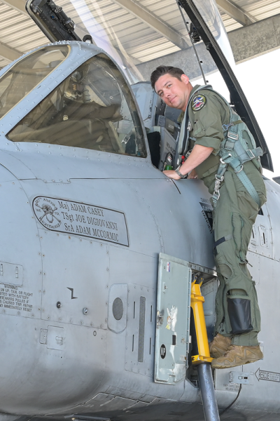  Michigan Air National Guard Maj. Jason Holm stands on the steps outside of an A-10 Thunderbolt II on June 13.  
