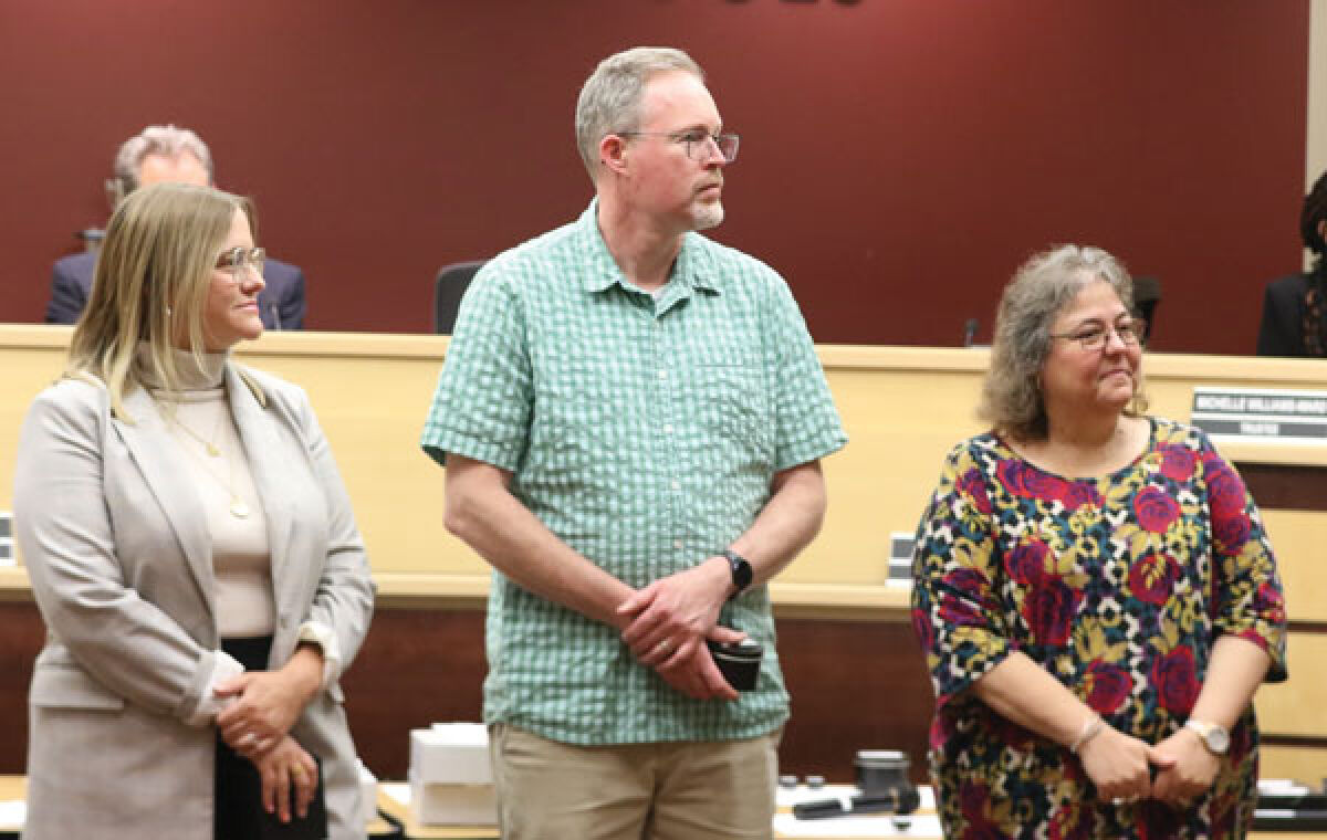  Roseville Community Schools years of service honorees Angie Houghton, Dan Chesher and Carol Shulgon are recognized. 