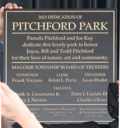 Pitchford Park’s dedication plaque reads, “Pamela Pitchford and Joe Kay dedicate this lovely park to honor Joyce, Bill and Todd Pitchford for their love of nature, art and community.” 