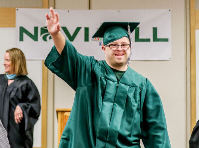  Michael Manning celebrates his graduation. 