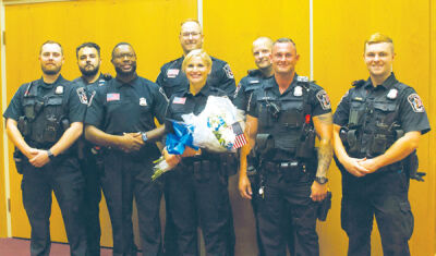  Roseville Police Department officers pose for a picture following a June 25 badging ceremony at a City Council meeting. 