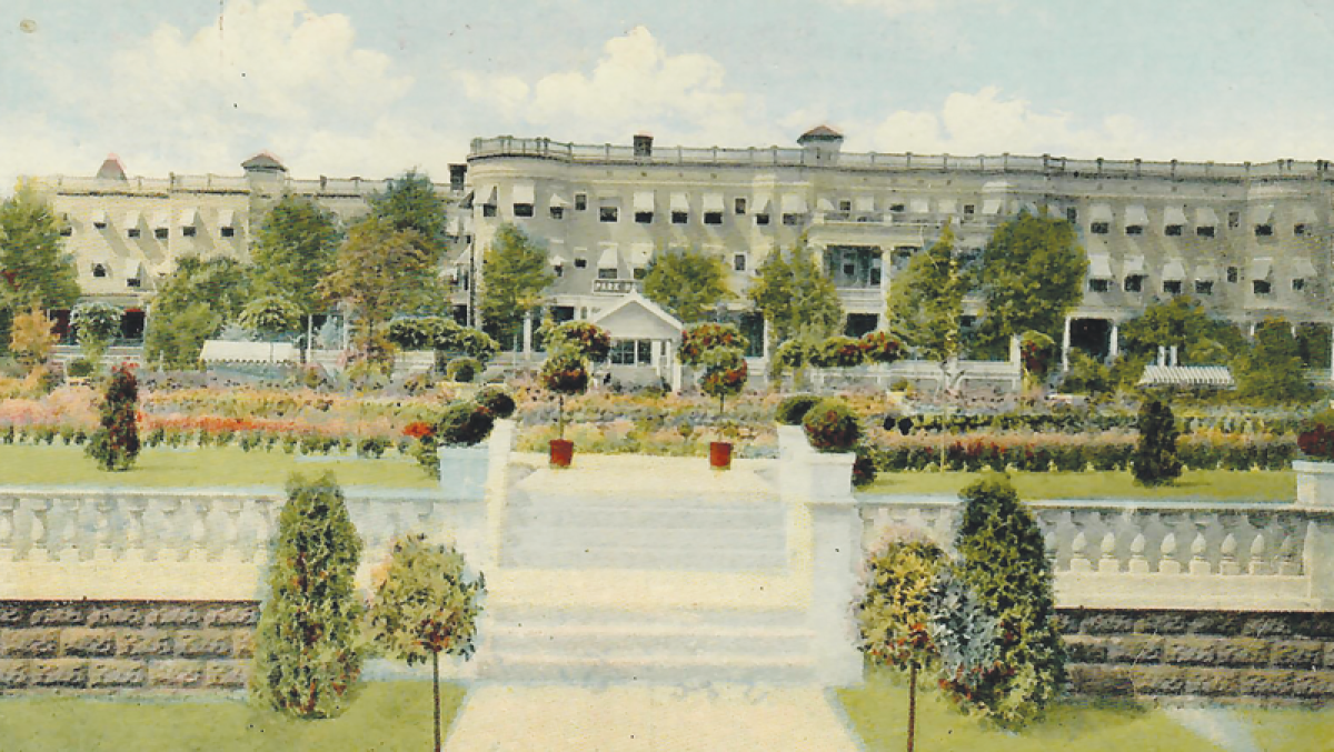  The Park Hotel as depicted on a postcard from the early 20th century. Its location is currently home to the Park Place Towers and a garage housing the old hotel’s well.  