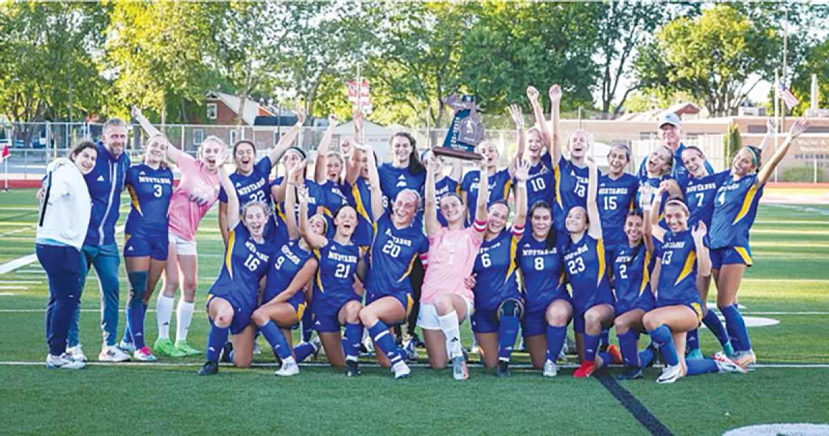  Bloomfield Hills Marian celebrates its regional title win after falling short in 2023 in a 3-2 loss to Grosse Pointe North in the regional semifinals.  