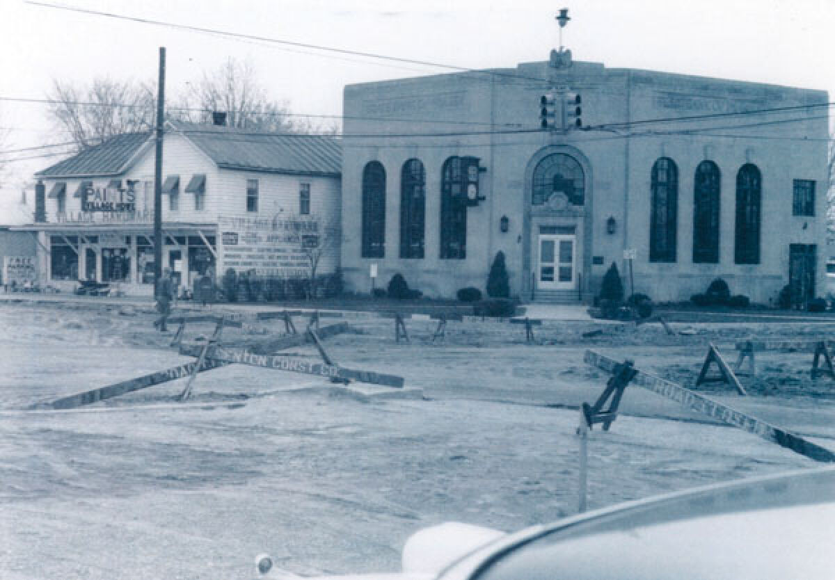  This photo shows the State Bank of Fraser before it had an extension added in 1958. 