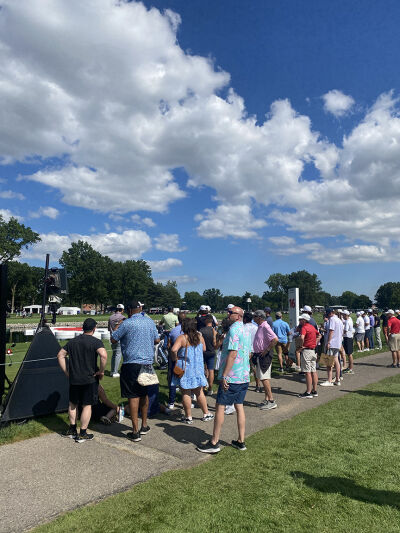  Rocket Mortgage Classic fans surround the 16th tee box as a player prepares to tee off. 