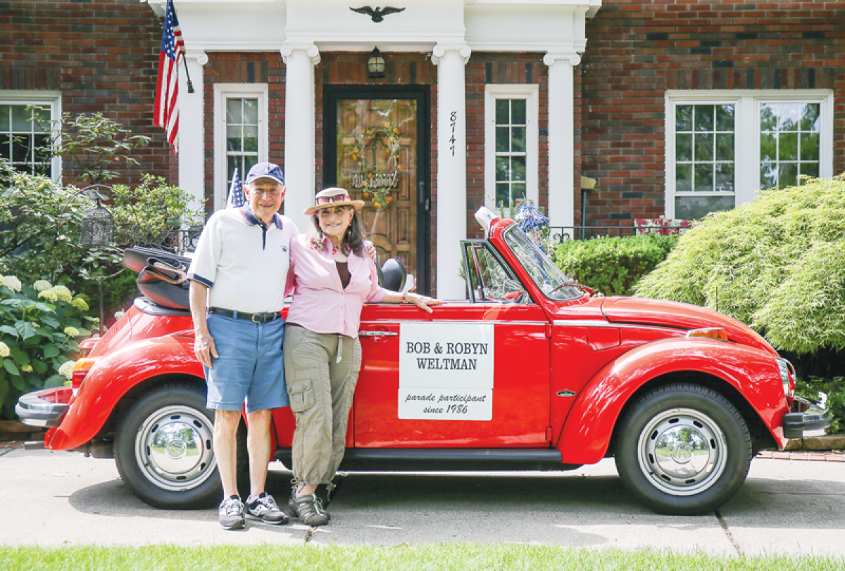 Bob and Robyn Weltman pose with their 1978 Volkswagen Beetle. The Beetle again will be in the annual Fourth of July parade in Huntington Woods on July 4.  