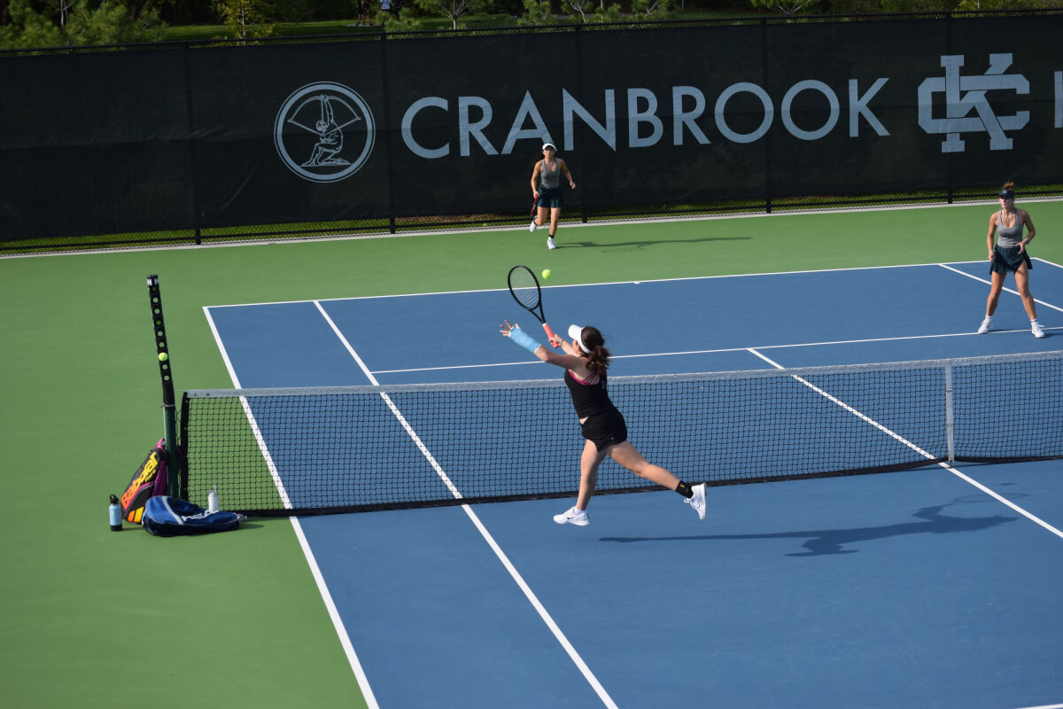  Birmingham Seaholm junior Jordyn Lusky reaches out to make a play in a match at Cranbrook High School this year. 