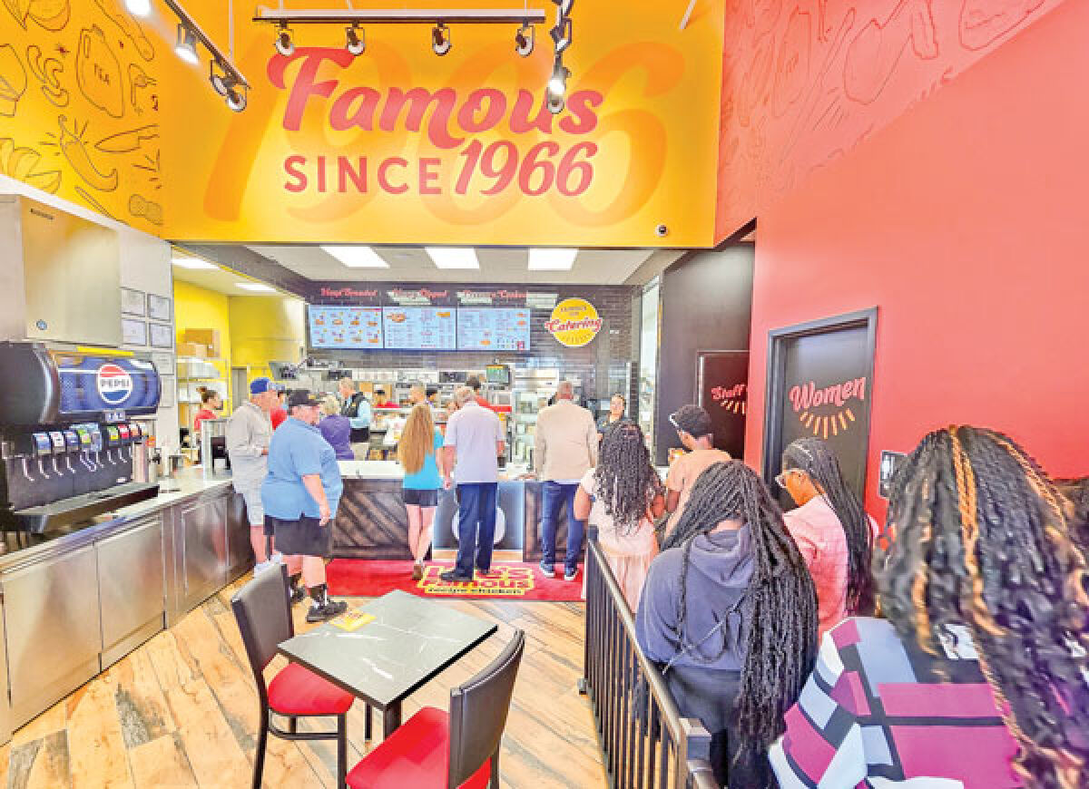  The first 200 Lee’s customers in line July 11 received a free meal, courtesy of the eatery. 