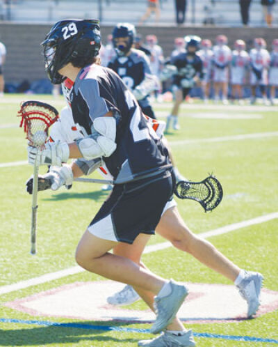  Royal Oak-Berkley freshman Ethan Couzens controls the ball during a matchup this year. 