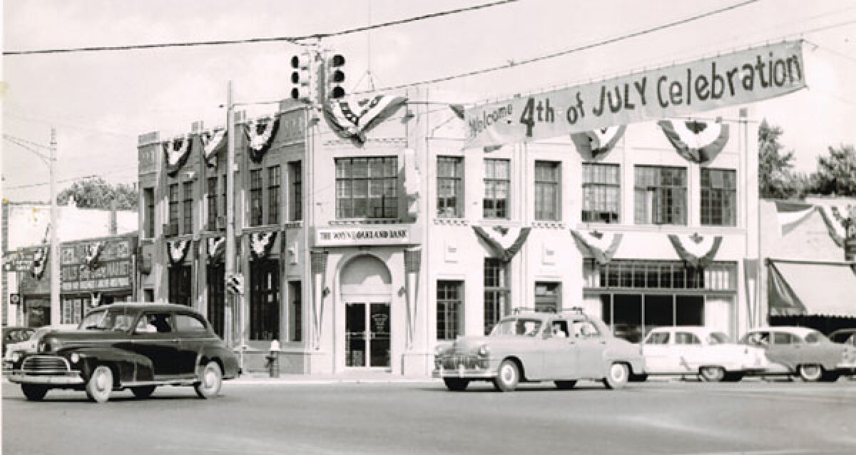  A Fourth of July banner was hung across the streets of Clawson in 1954 to encourage the community to come to the parade. 