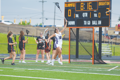  Bloomfield Hills senior Ella Lucia celebrates after scoring a goal against Brighton in the MHSAA Division 1 semifinals June 5 at Fenton High School. 