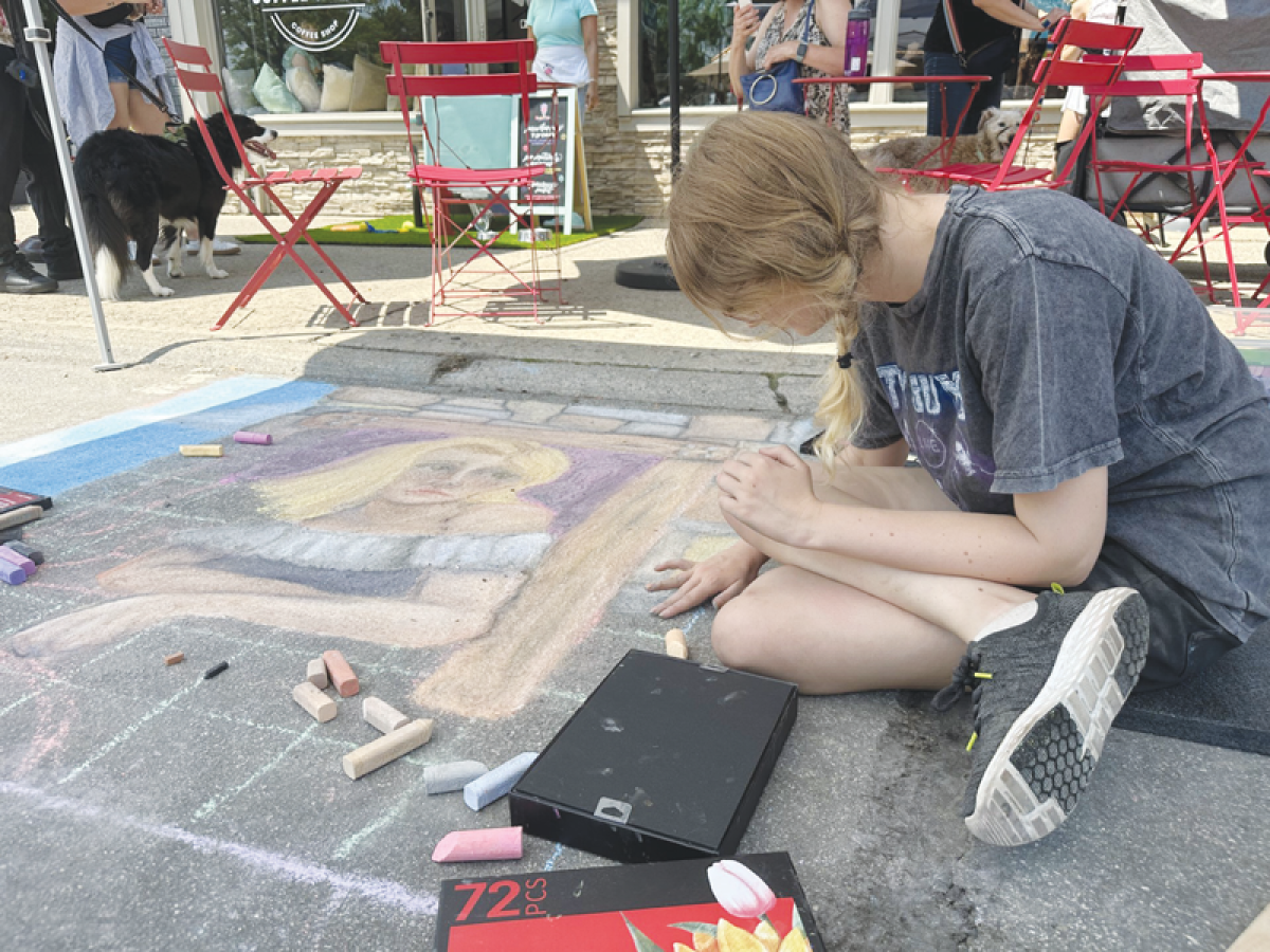  Sam Balwinski created a mural of Rapunzel for the chalk art contest at the Berkley Street Art Fest on July 13. 