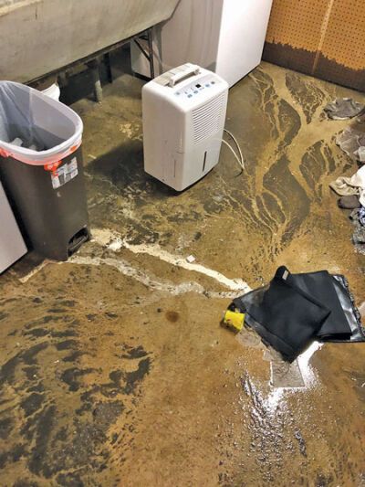  Michael Watkins’s basement flooded after the June 20 storm. Watkins said that not only did the sewage in his basement cause damage to his belongings, but also to his health. 